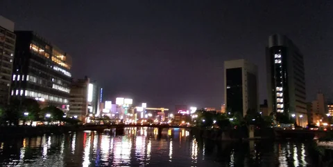Reflections and evening lights on the Nakasu waterfront in Fukuoka
